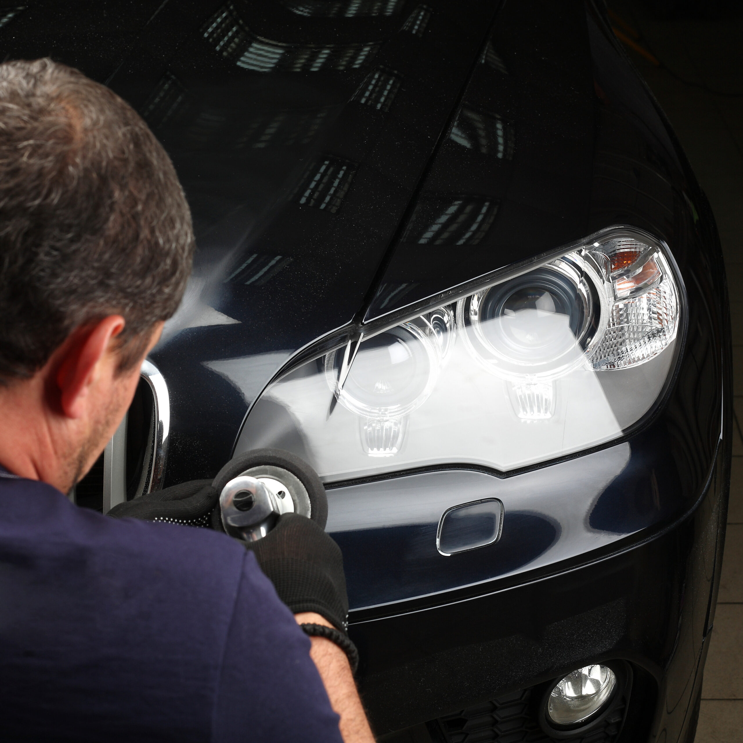 Car service. Polishing of optics of the car